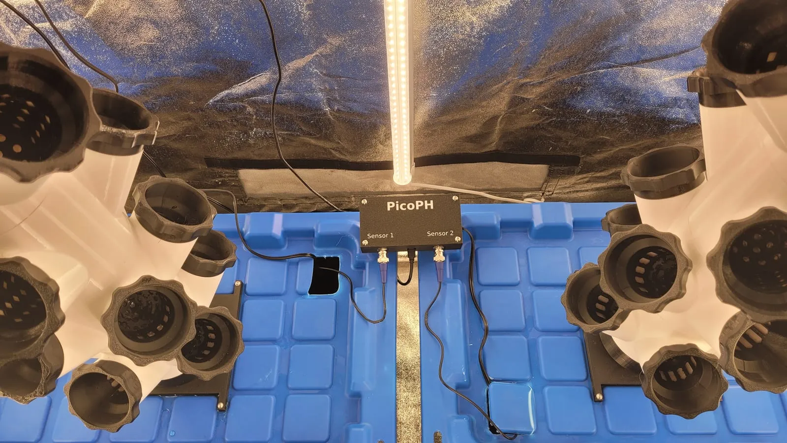 The finished PicoPH unit installed beside the 3D-printed hydroponic grow towers